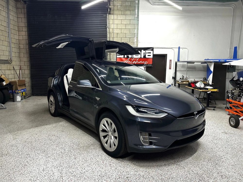 Tesla Model X with falcon-wing doors open
